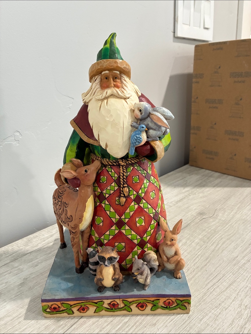 Hand-Painted Holiday Santa Figurine with Woodland Animals - Multicolor